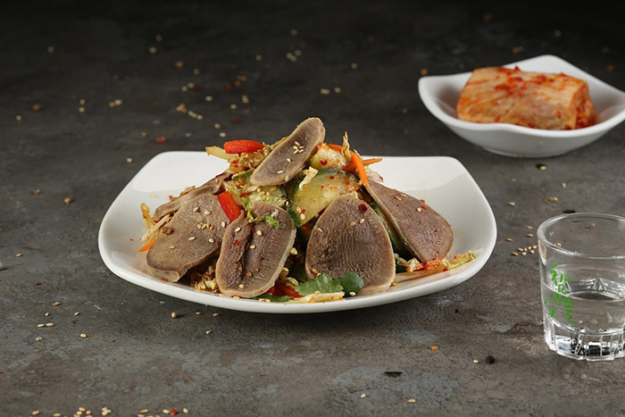 Beef tongue salad with vegetables
